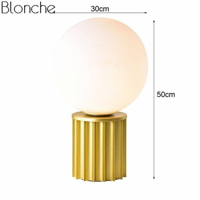 Lampe à poser design dorée avec boule LED