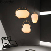 Luminaire LED doré en verre arrondi - Suspension design