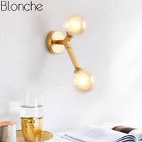 Applique murale dorée avec globe en verre RoyalSphere