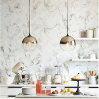 Suspension LED en boule de verre Loft.