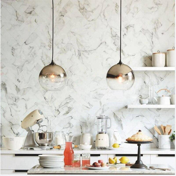 Suspension LED en boule de verre Loft.