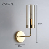 Applique murale design en verre et base dorée"Cylindre Chic"