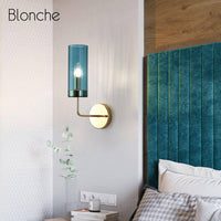 Applique murale design en verre et base dorée"Cylindre Chic"