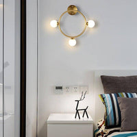 Applique murale LED dorée "Lumière Éclatante"