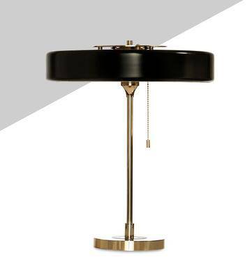 Lampe de chevet design : doré avec abat-jour blanc.