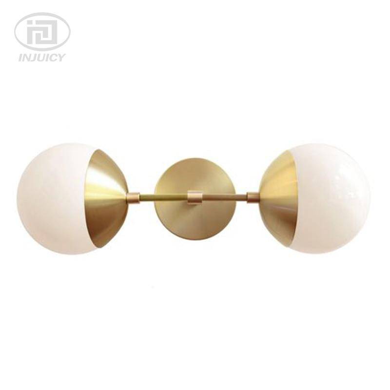 Applique murale dorée Bean, bras en verre à boule