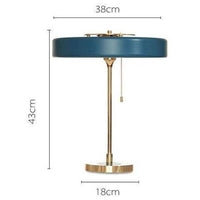 Lampe de chevet dorée Mesa.