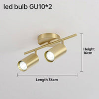 Spot design à LED en métal doré pour un éclairage élégant. | Marco Lucetti B / Froide