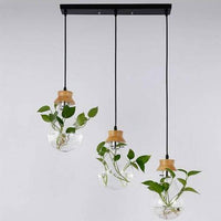 Suspension bocal en verre pour fleurs, support en bois | Marco Lucetti