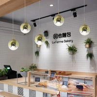 Suspension boule chromée - Design moderne | Marco Lucetti