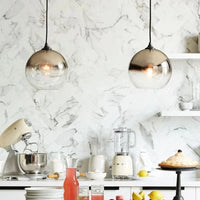 Suspension boule moderne en verre avec éclairage LED | Marco Lucetti