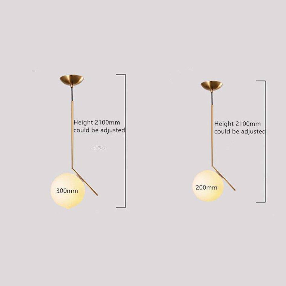Suspension chic : barre dorée et boule en verre | Marco Lucetti