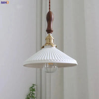 Suspension  design en céramique associant prise en cuivre et bois | Marco Lucetti