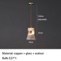 Suspension design en verre transparent avec accents bois et cuivre | Marco Lucetti