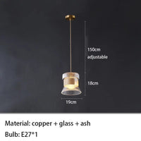 Suspension design en verre transparent avec accents bois et cuivre | Marco Lucetti