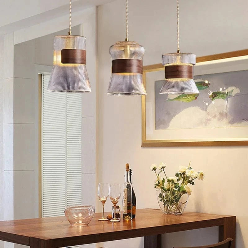 Suspension design en verre transparent avec accents bois et cuivre | Marco Lucetti