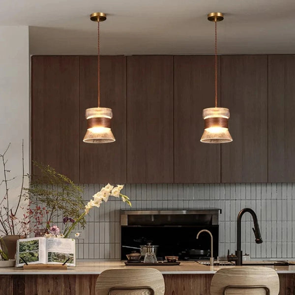 Suspension design en verre transparent avec accents bois et cuivre | Marco Lucetti