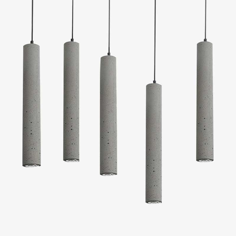 Suspension LED allongée en ciment gris.
