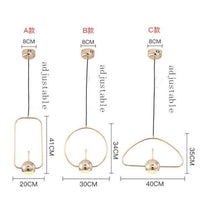 Suspension dorée LED aux formes design. | Marco Lucetti