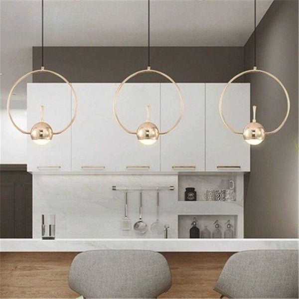 Suspension dorée LED aux formes design. | Marco Lucetti