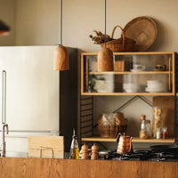 Suspension en bois massif en forme arrondie | Marco Lucetti