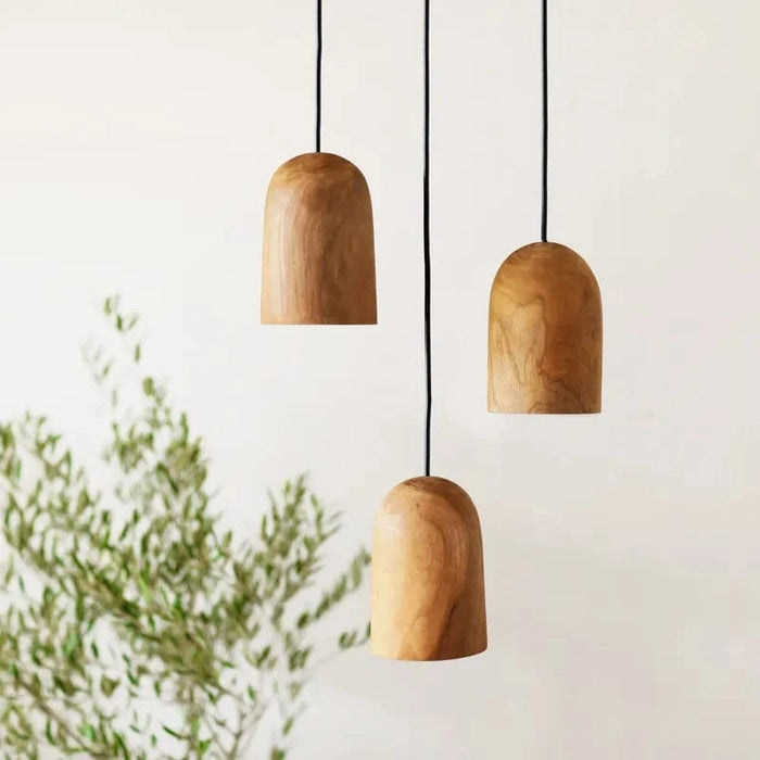 Suspension en bois massif en forme arrondie | Marco Lucetti