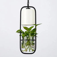 Suspension en cage contemporaine avec abat-jour en verre et fer | Marco Lucetti