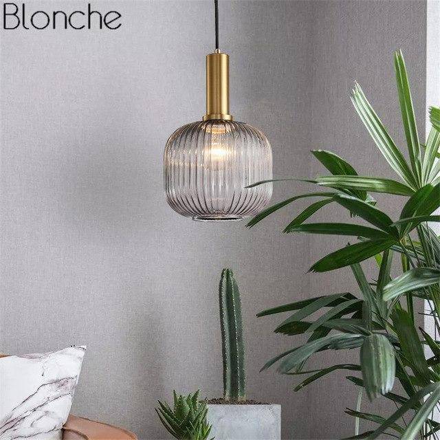 Suspension en verre coloré et base dorée, style élégant. | Marco Lucetti Fumé