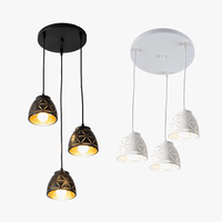 Suspension industrielle noir en métal. | Marco Lucetti