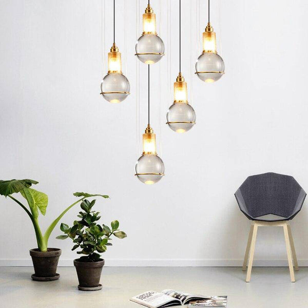 Suspension LED dorée en métal avec abat-jour en verre de luxe | Marco Lucetti