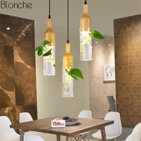 Suspension LED en bois avec plante et réservoir d'eau Bottle - Luminaire EcoGreen | Marco Lucetti