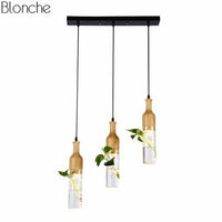 Suspension LED en bois avec plante et réservoir d'eau Bottle - Luminaire EcoGreen | Marco Lucetti 3 lampes - Base longue