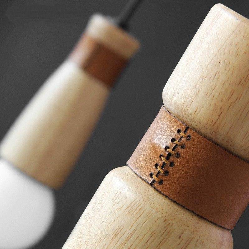 Suspension LED en bois et similicuir | Marco Lucetti