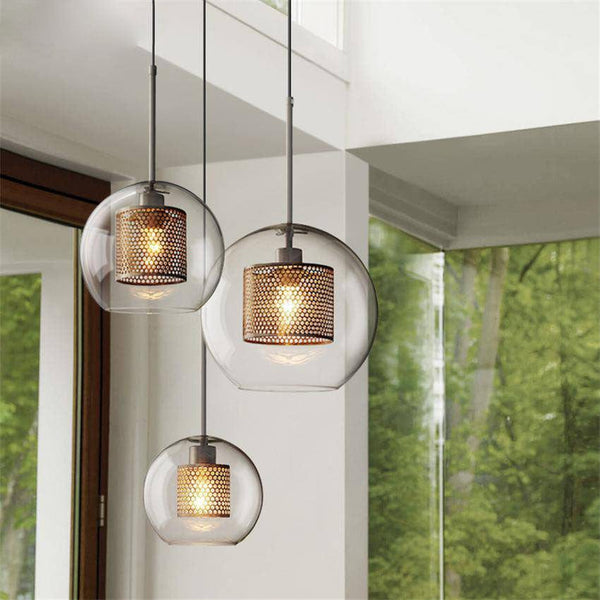 Suspension LED en verre avec lampe dorée. | Marco Lucetti