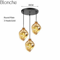 Suspension LED Lava en verre coloré | Marco Lucetti Doré - 3 lampes - Base rond