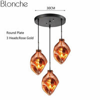 Suspension LED Lava en verre coloré | Marco Lucetti Orange - 3 lampes - Base ronde
