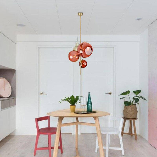 Suspension LED Luxe : Tige dorée, 3 boules verre rouge | Marco Lucetti