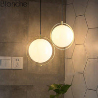 Suspension LED moderne en verre et métal doré | Marco Lucetti