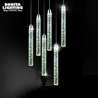 Suspension LED moderne minimaliste "Crystal Glow" pour salle à manger - Tube cylindrique long pour plafonds hauts | Marco Lucetti