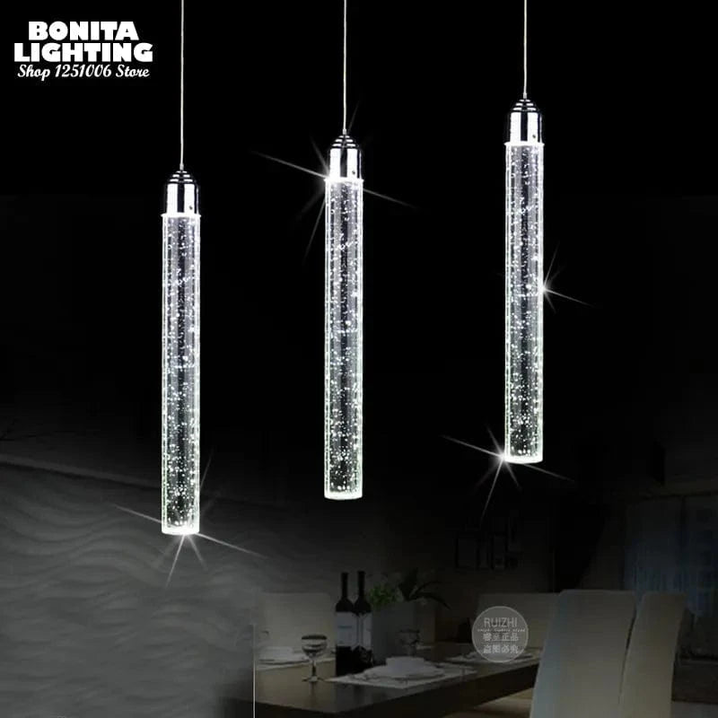 Suspension LED moderne minimaliste "Crystal Glow" pour salle à manger - Tube cylindrique long pour plafonds hauts | Marco Lucetti
