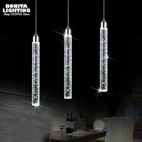 Suspension LED moderne minimaliste "Crystal Glow" pour salle à manger - Tube cylindrique long pour plafonds hauts | Marco Lucetti