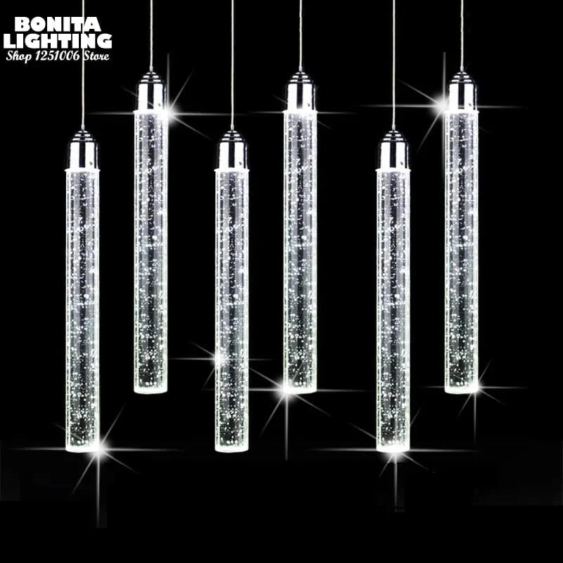 Suspension LED moderne minimaliste "Crystal Glow" pour salle à manger - Tube cylindrique long pour plafonds hauts | Marco Lucetti