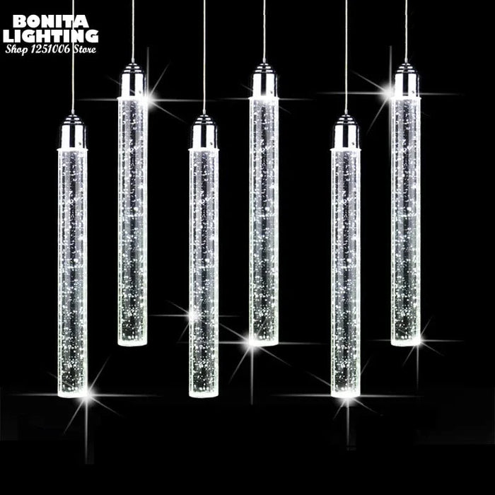 Suspension LED moderne minimaliste "Crystal Glow" pour salle à manger - Tube cylindrique long pour plafonds hauts | Marco Lucetti