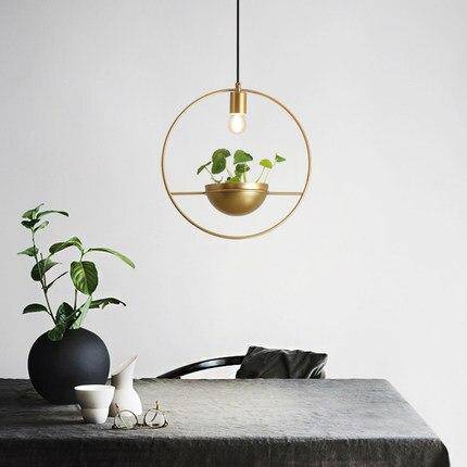 Suspension LED ronde dorée avec pot de fleur - Luxe & Design | Marco Lucetti