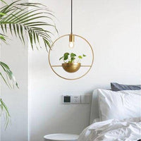 Suspension LED ronde dorée avec pot de fleur - Luxe & Design | Marco Lucetti