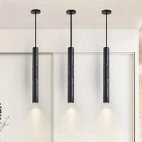Suspension LED ultra-fine en pierre noire perforée - Design minimaliste modern. | Marco Lucetti