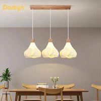 Suspension lumineuse en verre au design nordique innovant | Marco Lucetti