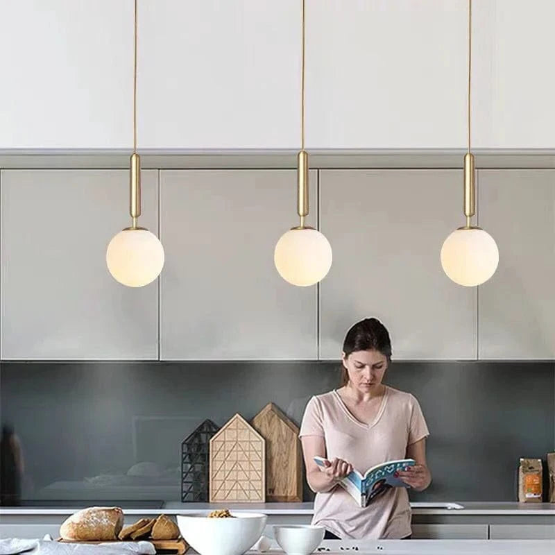 Suspension Luxe Laiton Noir Boule LED | Marco Lucetti