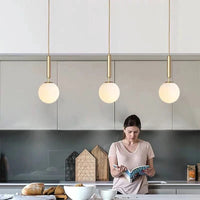 Suspension Luxe Laiton Noir Boule LED | Marco Lucetti