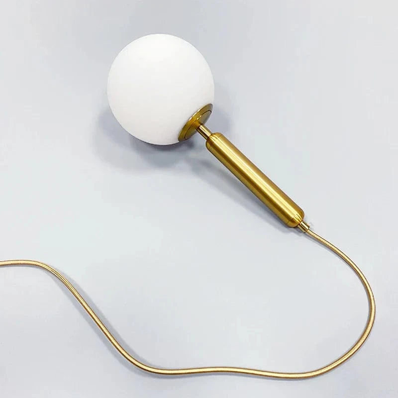 Suspension Luxe Laiton Noir Boule LED | Marco Lucetti